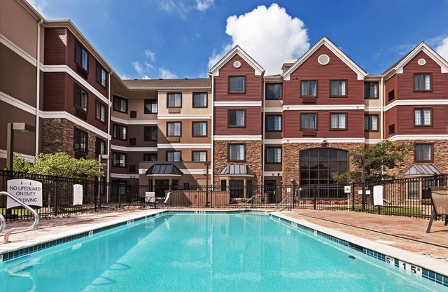 King Suite in Tulsa | Free Breakfast + Fitness Center + Seasonal Outdoor Pool