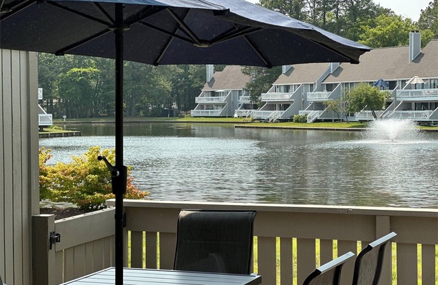 Lakefront Sea Colony Villa! Amenity Rich with Private Beach and Shuttle!