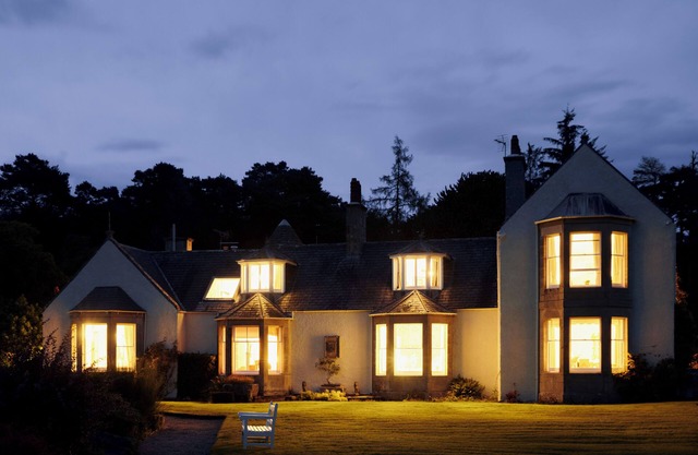Lochside Luxury: Historic Home with Stunning Scottish Woodland Views