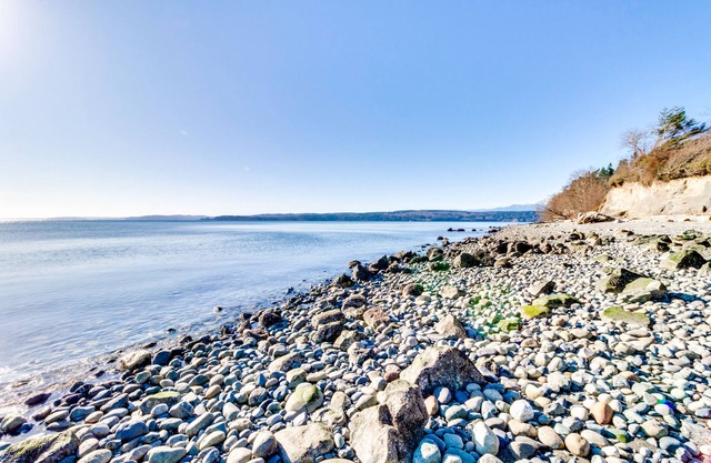 Lovely, oceanfront home with multiple sea views and beach access