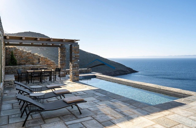 Luxurios Villa Helios with a swimming pool and direct access to a sandy beach.