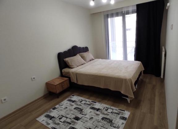 Luxurious 2 bedroom flat with pool and garden.