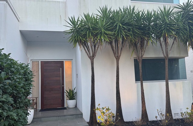 Luxurious Parkside residence, architecturally designed tri-level home with pool.