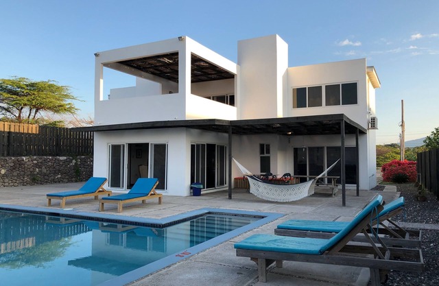 Luxury beach front villa with private pool and personal chef included.