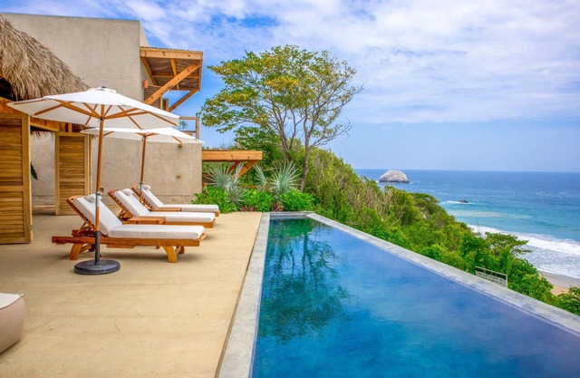 Luxury home with pool and breathtaking views just a few steps from the beach