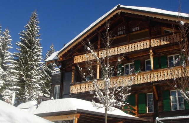 Luxury top two floors of ski chalet in Murren with 360 views. Sleeps 10-11