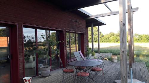Maison bois à la campagne