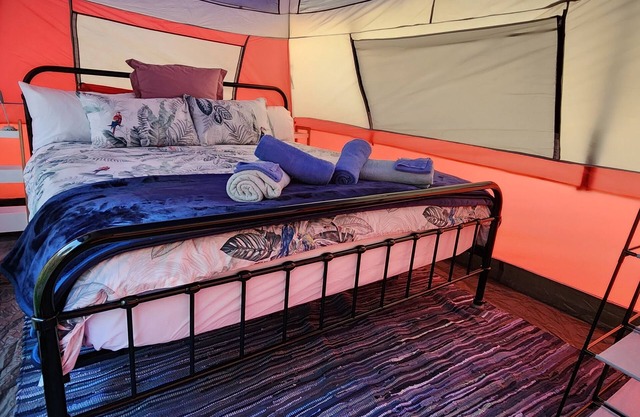 Meyenburg King bed tent with shared outdoor shower & wc