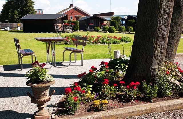 Milano Garden - City Bungalow Hotell, i gränssnittet till Kullabygdens pärlor