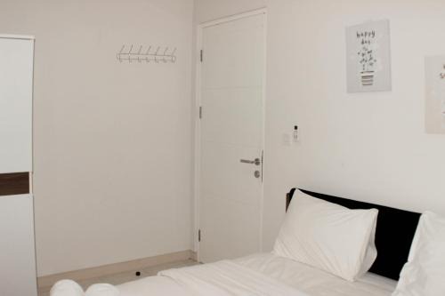 Minimalist and Comfort 2BR at Springlake Summarecon Bekasi Apartment By Travelio