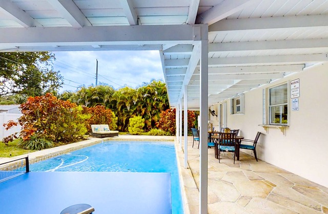 Modern home & guest suite with private pool, AC, & dog-friendly fenced yard