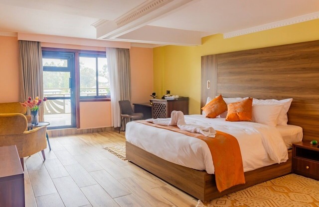 Modern Room in Karen Plains Hotel, Nairobi , with Balcony and Workspace