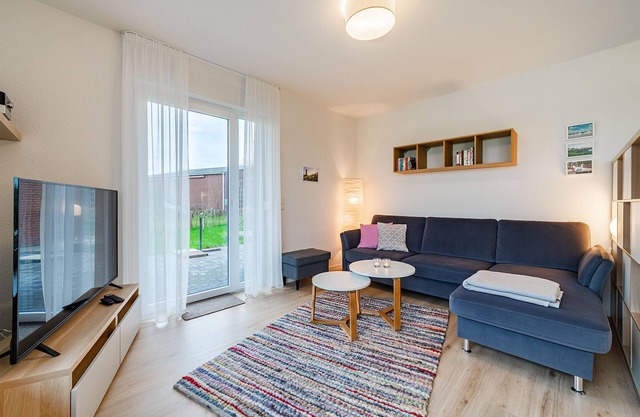 Modern "Stuuv" vacation apartment with a view of the Greetsiel twin mills