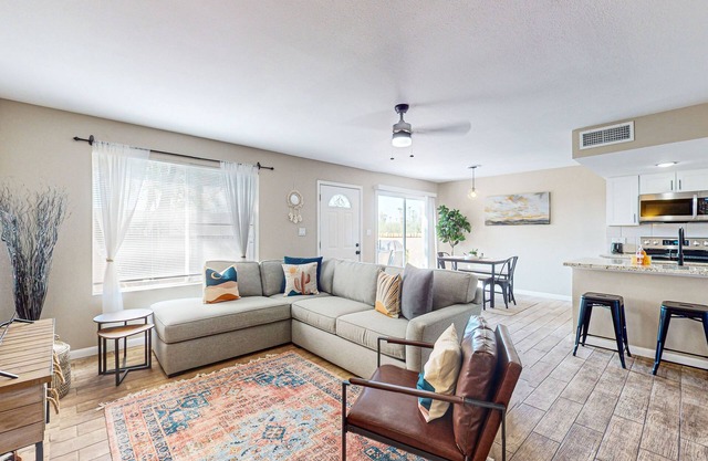 Modern townhome with pool, AC, W/D, grill, and private patio