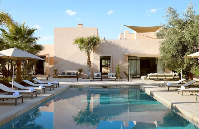 My Rental Homes | Villa Eleganza pool, garden and house staff