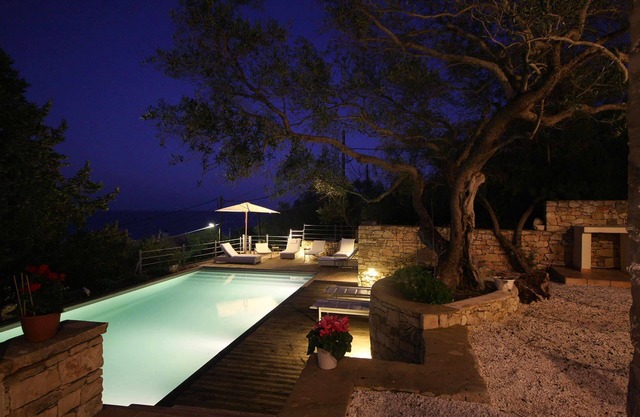 My Rental Homes - The Olive Grove with large pool and veranda with sea views.