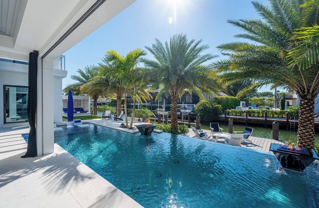 NEW! Amazing Modern Waterfront Luxury at its Finest! Features 4 bedrooms n