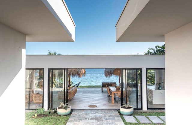 NEW: Architect-designed villa with waterfront terrace