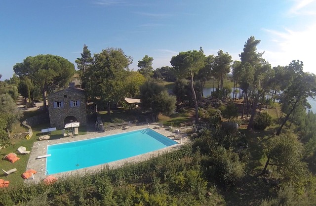 NEW. Large traditional Corsican property, feet in fresh water .