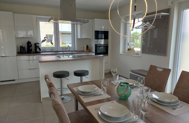 NEW! modern, high-quality, central apartment, with sauna, garden, wallbox in Burhave