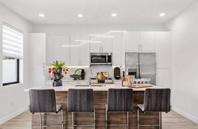 NEW PREMIER SPECIALS, 4 Townhomes