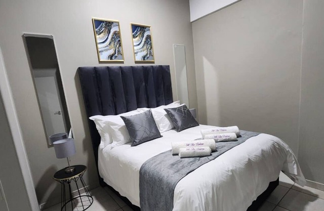 Newley refurbished apartment just a short stroll away from Rosebank Mall!