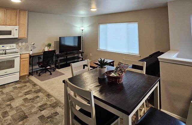 NEWLY BUILT TOWNHOME W/ 2 BEDROOM & HEATED GARAGE