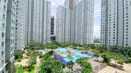 Nice and Strategic 2BR at Green Bay Pluit Apartment By Travelio