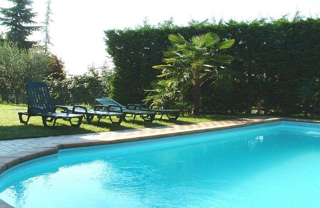 Nice apartment for 4 guests with A/C, pool, WIFI, TV, terrace, pets allowed and parking