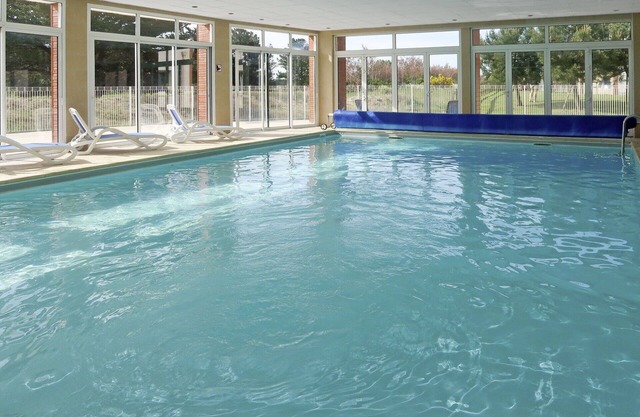 Nice apartment for 4 people with WIFI, pool, TV, terrace, pets allowed and parking
