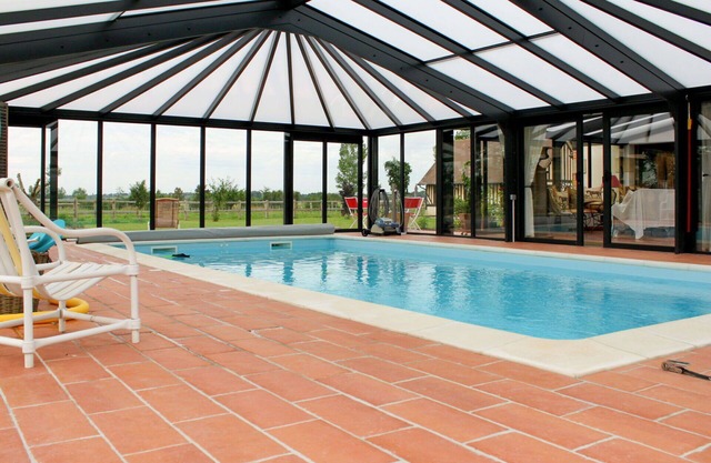 Nice apartment in villa for 3 guests with pool, WIFI, TV, patio, pets allowed and parking