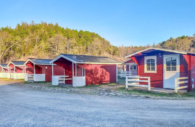 Nice small wooden cottage on natural plot by the sea fjord.