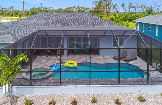 Nicest home in Rotonda! New home with spa, on canal with dock- so many amenities