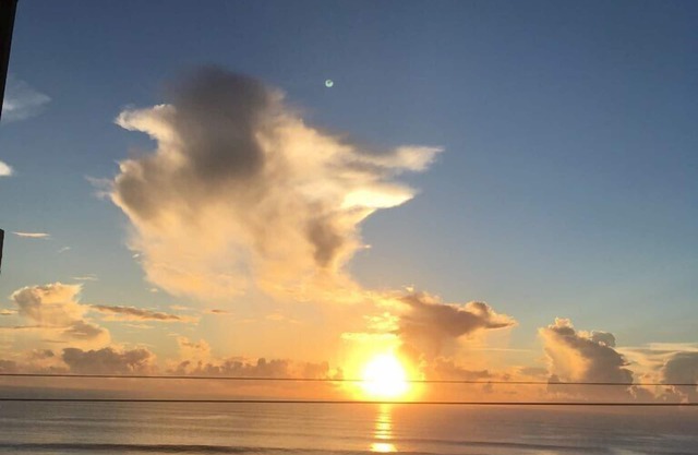 Ocean front condo with direct ocean view in quiet Ormond by the Sea