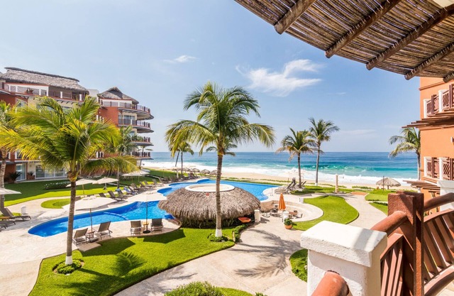 Ocean View 3 Bedroom Residence with Resort Amenities Steps from the Beach!