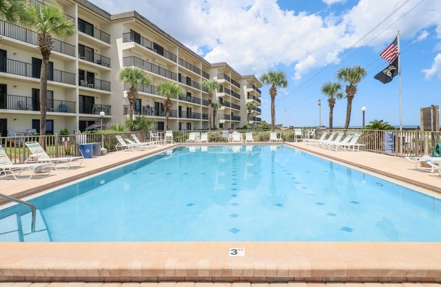 Oceanfront condo with easy beach access, sundeck & pool with a view