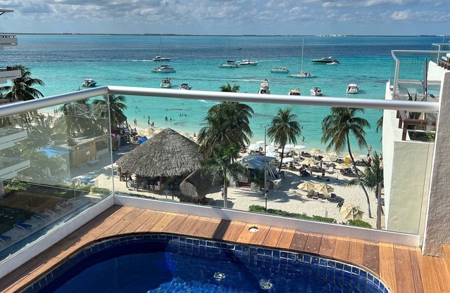 Oceanfront Modern Penthouse in Playa Norte text us 317-652-1366