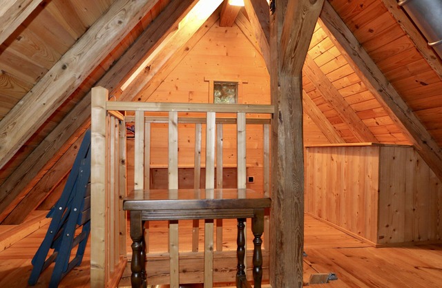 Old small renovate mountain cowshed, in rural environment