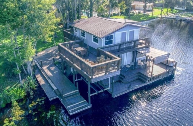 One of a Kind Fully Renovated Historic Boathouse with TRIZILLION dollar views!
