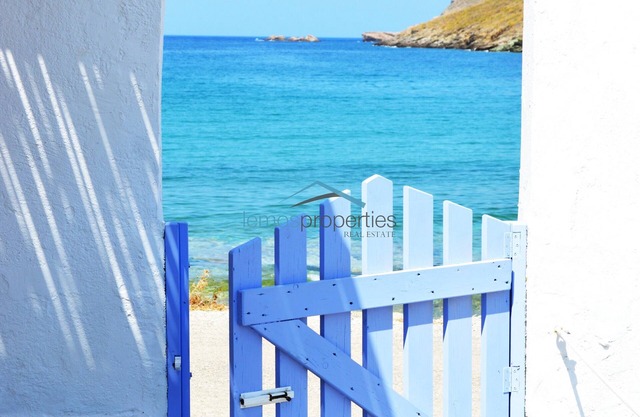 Original stone built house on the waterfront with access to a large sandy beach