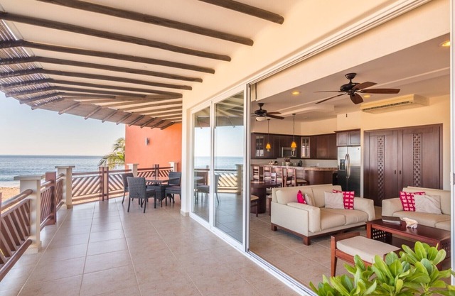 Partial Ocean View 2 Bedroom Residence with Resort Amenities Steps from Beach!