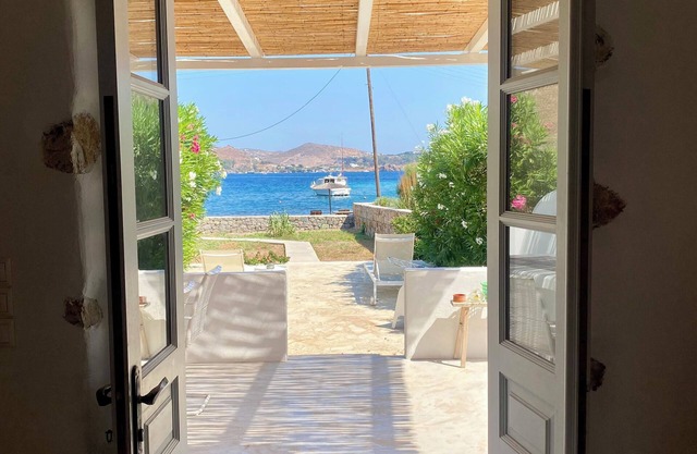 Patmos Beach Stone House. Slow Living on the beach.