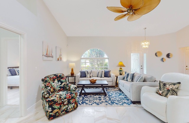 Peaceful home with pool, patio, lanai, TV & fitness room - snowbird-friendly
