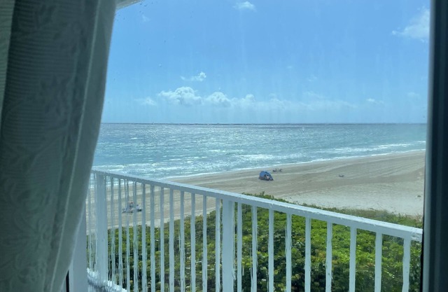 Peaceful studio condo on a private beach with full kitchen