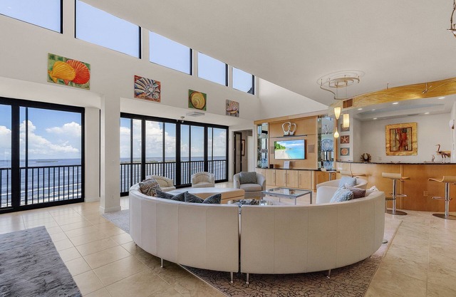 Penthouse Oasis: 180° Water Views & Heated Pool