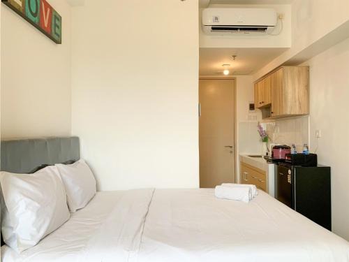 Pleasurable 2BR Transpark Juanda Apartment By Travelio