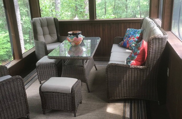 Privacy surrounds this home with a mountain view and lake access.