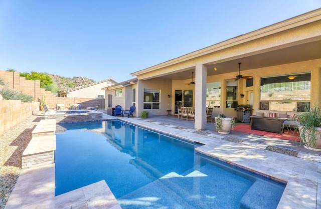 Private desert dream home with enclosed yard, pool, furnished lanai, & grill