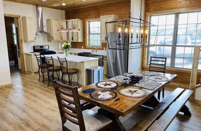 Private Ranch with well-appointed 4 bed/4 bath log cabin!