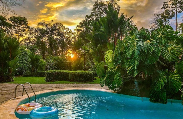 Private suite 102 with beautiful gardens, shared pool and BBQ area!